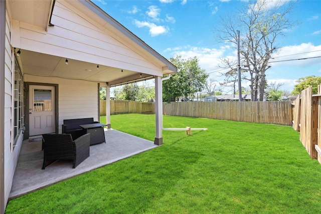 212 Bryan Way, Angleton, TX 77515 - view of yard featuring a patio area and a fenced backyard