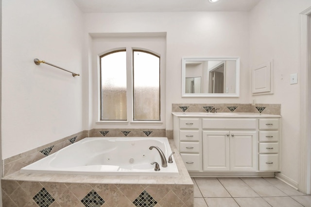 6423 Middlelake Ct, Katy, TX 77450 - bathroom with a tub with jets, vanity, and tile patterned floors