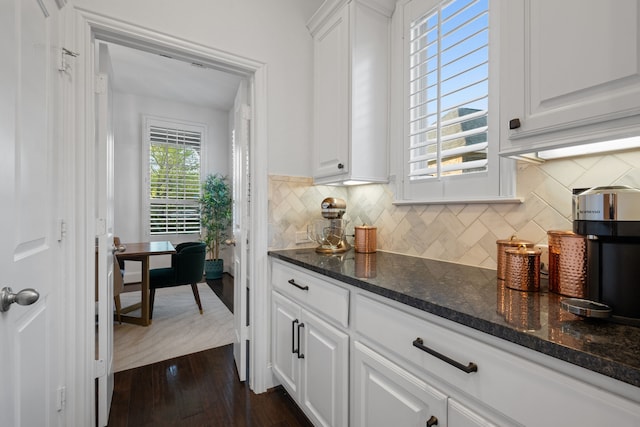 19843 Quarry Stone Ln, Richmond, TX 77407 - bar with backsplash and dark wood-style floors