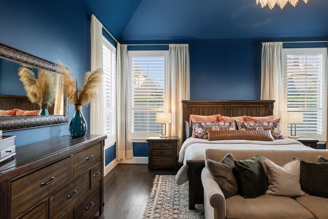 19843 Quarry Stone Ln, Richmond, TX 77407 - bedroom with dark wood-style flooring, baseboards, and lofted ceiling