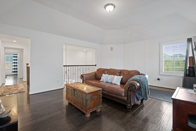 19843 Quarry Stone Ln, Richmond, TX 77407 - living room featuring dark wood finished floors, plenty of natural light, and baseboards