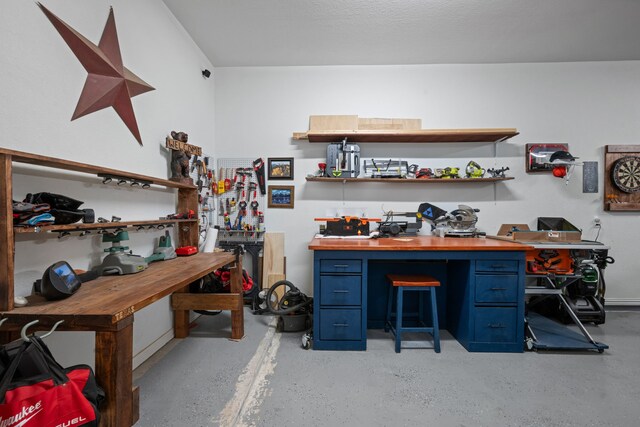 19843 Quarry Stone Ln, Richmond, TX 77407 - bar area with a workshop area and finished concrete flooring