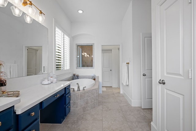19843 Quarry Stone Ln, Richmond, TX 77407 - bathroom featuring a garden tub and vanity