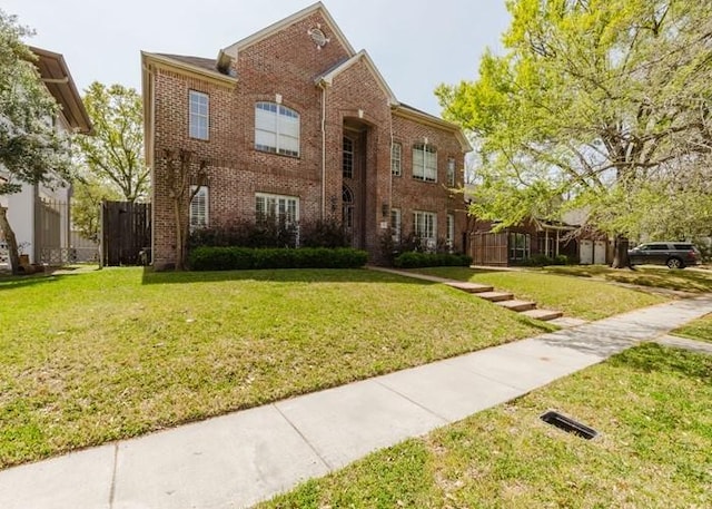 4135 Bellefontaine, Houston, TX 77025 - view of front of property featuring brick siding and a front yard