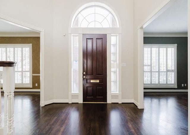 4135 Bellefontaine, Houston, TX 77025 - foyer with wood finished floors, baseboards, and ornamental molding