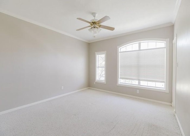 4135 Bellefontaine, Houston, TX 77025 - empty room with ornamental molding, light colored carpet, baseboards, and a ceiling fan
