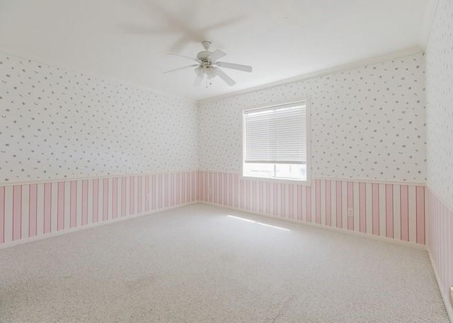 4135 Bellefontaine, Houston, TX 77025 - carpeted spare room with wallpapered walls and a ceiling fan