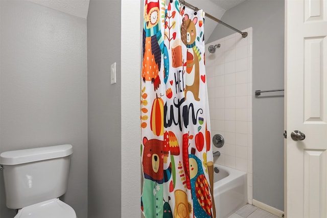 bathroom with toilet, tile patterned flooring, and shower / tub combo with curtain