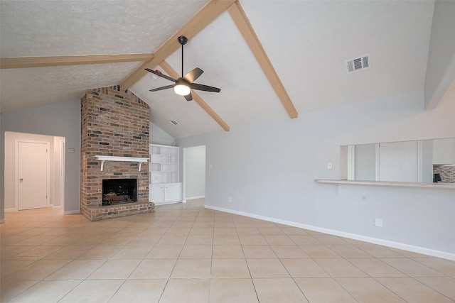 unfurnished living room featuring light tile patterned flooring, a brick fireplace, a textured ceiling, visible vents, and ceiling fan