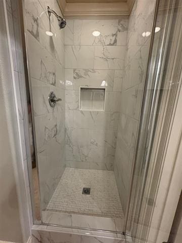 full bathroom with a shower stall