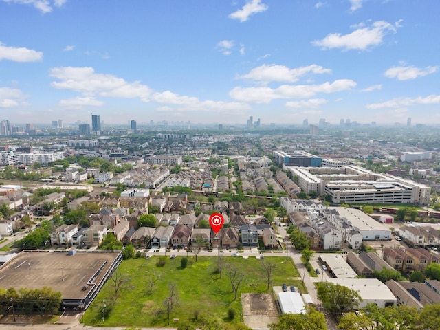drone / aerial view featuring a city view