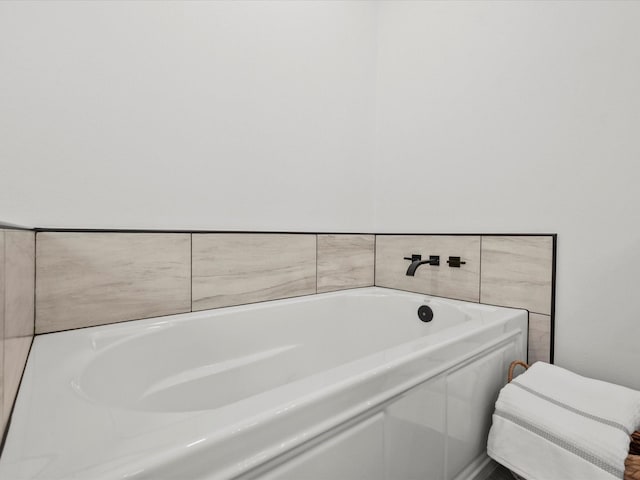 bathroom featuring a bath