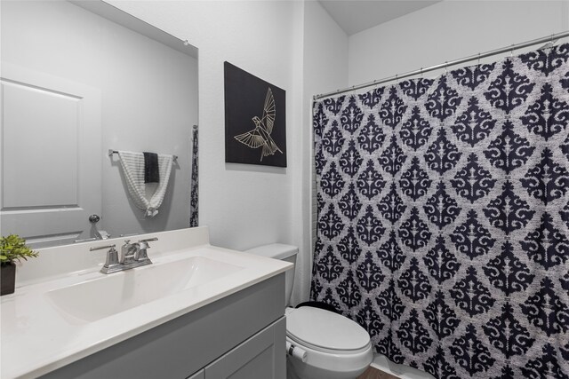 1100 Greenshank Dr, Katy, TX 77493 - bathroom featuring a shower with curtain, toilet, and vanity