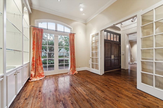 5079 Cedar Creek Dr, Houston, TX 77056 - entrance foyer featuring french doors, ornamental molding, dark wood-style floors, baseboards, and recessed lighting