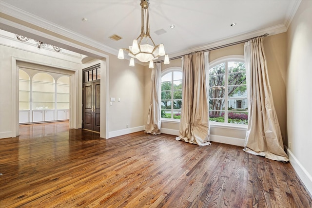 5079 Cedar Creek Dr, Houston, TX 77056 - empty room with a chandelier, crown molding, baseboards, and wood finished floors