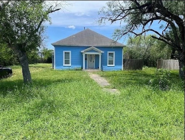 405 E Main St, Bishop, TX 78343 - bungalow-style house with roof with shingles and fence