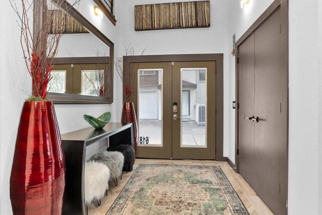 618 Lester St, Houston, TX 77007 - foyer featuring french doors and wood finished floors