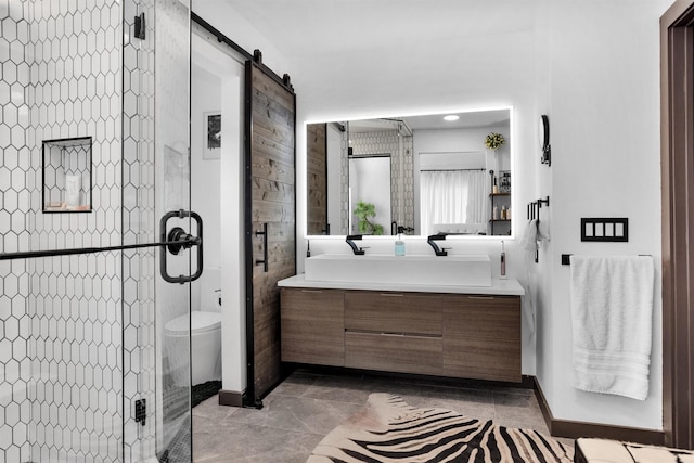 618 Lester St, Houston, TX 77007 - bathroom with a shower stall, vanity, and baseboards