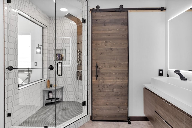 618 Lester St, Houston, TX 77007 - full bathroom featuring a shower stall, vanity, and tile patterned flooring