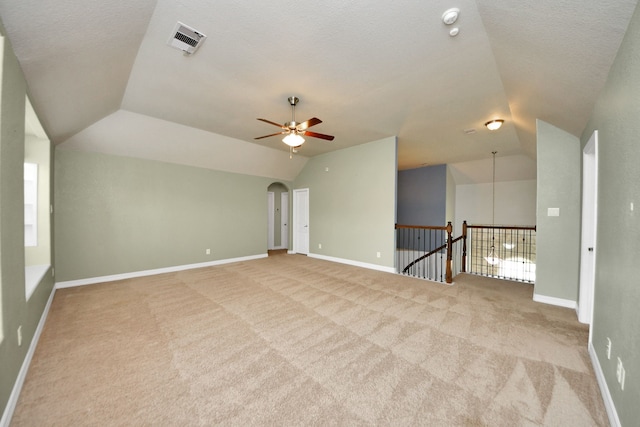 2019 Doolan Dr, Conroe, TX 77301 - carpeted empty room with ceiling fan, baseboards, lofted ceiling, and visible vents