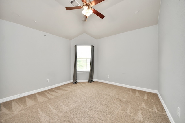 2019 Doolan Dr, Conroe, TX 77301 - unfurnished room featuring light colored carpet, vaulted ceiling, baseboards, visible vents, and a ceiling fan