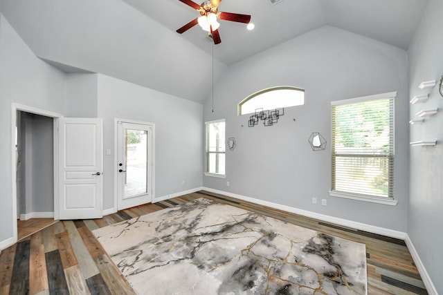 2019 Doolan Dr, Conroe, TX 77301 - foyer entrance featuring a wealth of natural light, baseboards, wood finished floors, and a ceiling fan