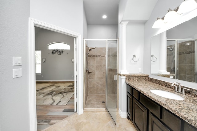 2019 Doolan Dr, Conroe, TX 77301 - full bathroom with baseboards, a shower stall, and vanity