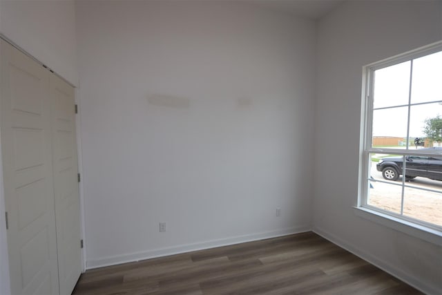 8526 Pier Cove Dr, Cypress, TX 77433 - spare room with dark wood-style flooring and baseboards