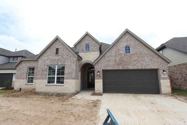 8526 Pier Cove Dr, Cypress, TX 77433 - french provincial home with brick siding, driveway, and an attached garage