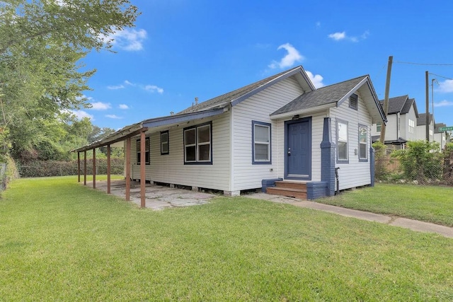 2831 Jones St, Houston, TX 77026 - view of front facade with a shingled roof and a patio area