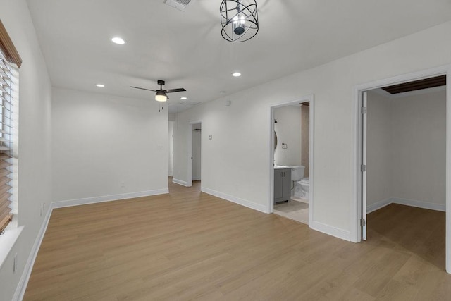 2831 Jones St, Houston, TX 77026 - unfurnished living room with light wood-type flooring, recessed lighting, and a ceiling fan