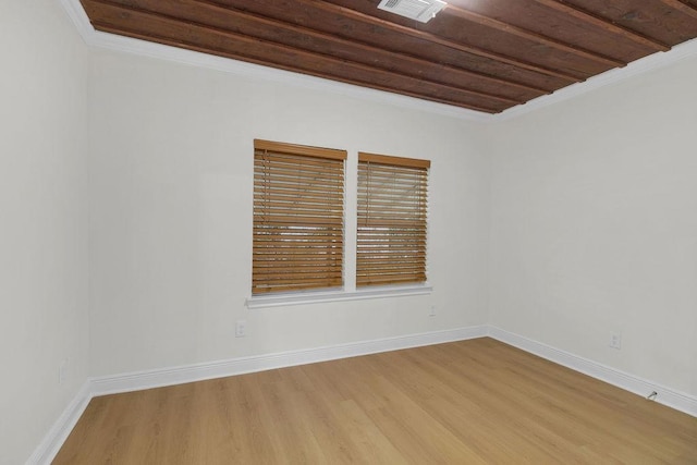 2831 Jones St, Houston, TX 77026 - spare room featuring wood finished floors and ornamental molding