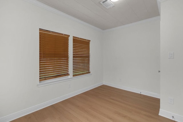 2831 Jones St, Houston, TX 77026 - empty room with wood finished floors and ornamental molding