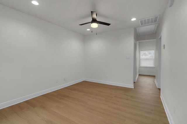 2831 Jones St, Houston, TX 77026 - empty room with attic access, a ceiling fan, light wood-style floors, and recessed lighting
