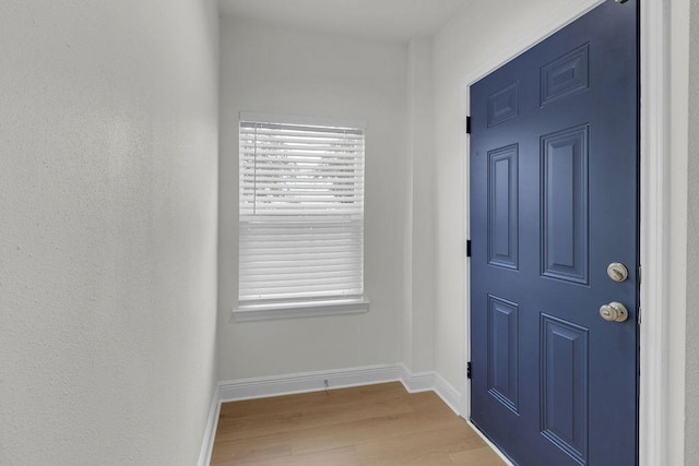 2831 Jones St, Houston, TX 77026 - foyer entrance featuring wood finished floors and baseboards