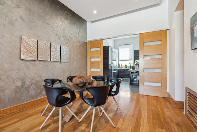 5417 Hidalgo St Unit B, Houston, TX 77056 - dining space featuring wood finished floors and recessed lighting