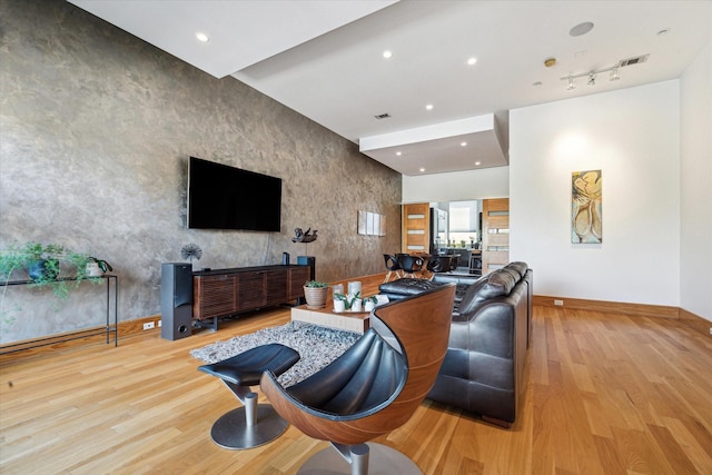 5417 Hidalgo St Unit B, Houston, TX 77056 - living area with baseboards, wood finished floors, and recessed lighting