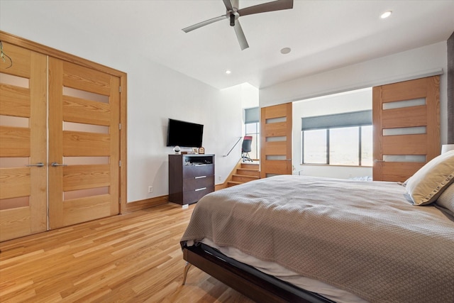 5417 Hidalgo St Unit B, Houston, TX 77056 - bedroom featuring light wood finished floors, baseboards, recessed lighting, and ceiling fan