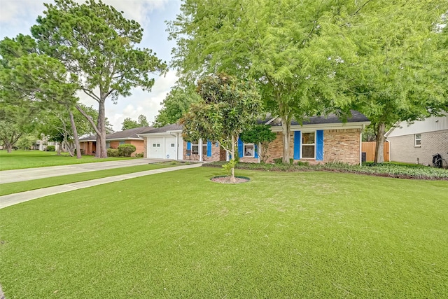5806 Cartagena St, Houston, TX 77035 - ranch-style home with driveway, brick siding, a garage, and a front yard