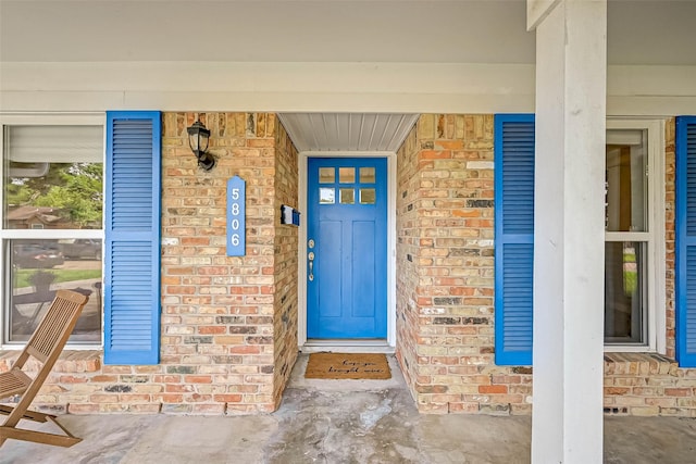 5806 Cartagena St, Houston, TX 77035 - property entrance with covered porch and stone siding