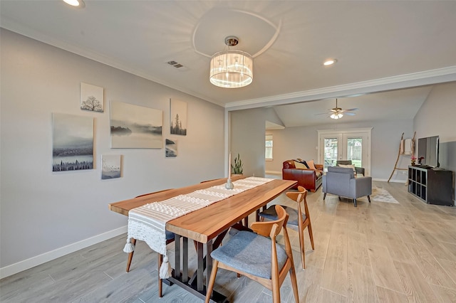 5806 Cartagena St, Houston, TX 77035 - dining space featuring visible vents, baseboards, recessed lighting, light wood-style floors, and ceiling fan with notable chandelier