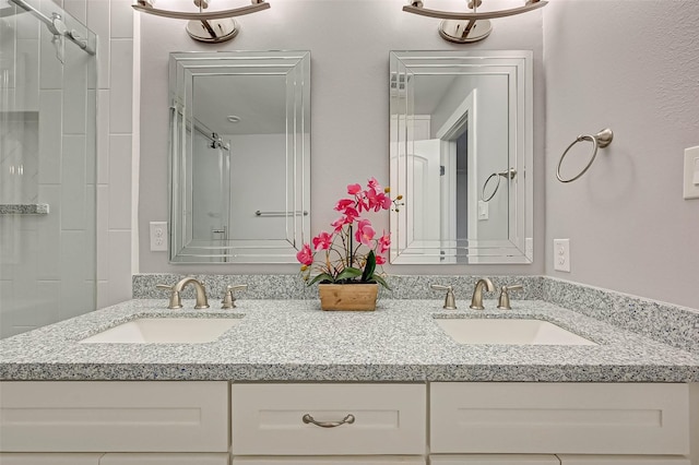 5806 Cartagena St, Houston, TX 77035 - full bathroom with a shower, double vanity, and a sink