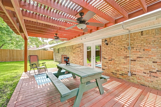 5806 Cartagena St, Houston, TX 77035 - deck featuring french doors, a ceiling fan, fence, a pergola, and a lawn