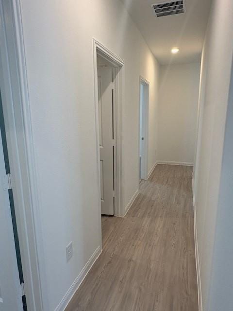 25519 Balsamroot Dr, Magnolia, TX 77355 - hall with light wood-style flooring and baseboards