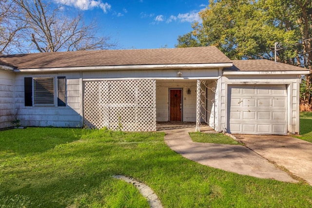 2320 Westward Ave, La Marque, TX 77568 - single story home with concrete driveway, roof with shingles, a garage, and a front lawn