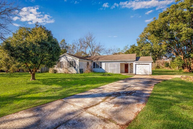 2320 Westward Ave, La Marque, TX 77568 - view of front of property with a front yard, driveway, and a garage