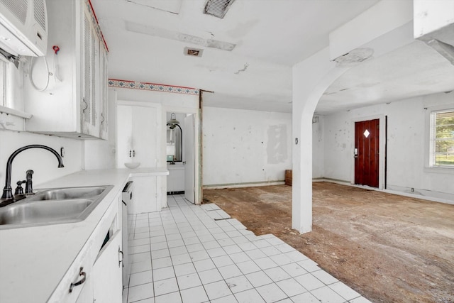 2320 Westward Ave, La Marque, TX 77568 - kitchen featuring visible vents, white cabinets, dishwasher, a sink, and light countertops