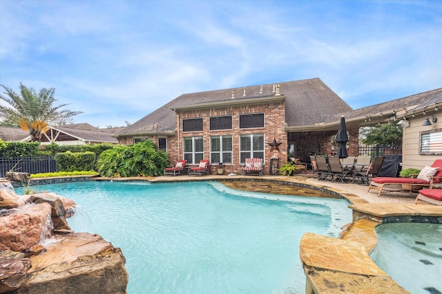 view of pool with fence, a fenced in pool, and a patio area