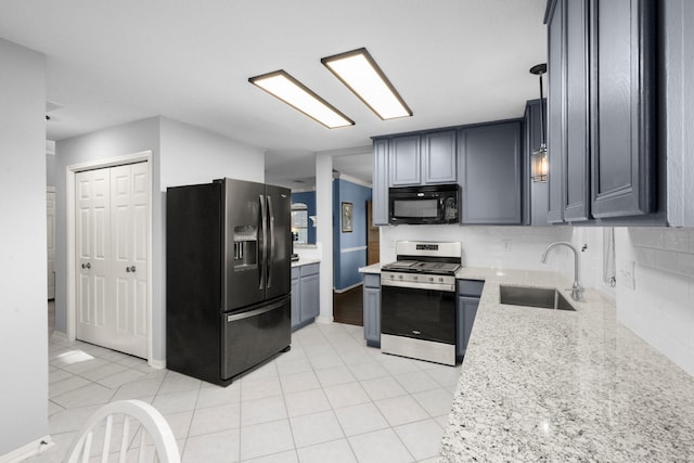 8922 Eaglecove Dr, Houston, TX 77064 - kitchen with fridge with ice dispenser, a sink, black microwave, stainless steel gas range oven, and decorative backsplash