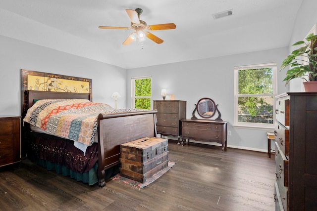 8922 Eaglecove Dr, Houston, TX 77064 - bedroom featuring visible vents, multiple windows, baseboards, and wood finished floors